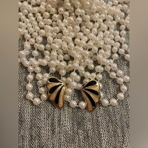 Vintage women earrings golden black and white colored